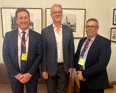 Andrew Gissing, Senator Tony Sheldon and Iain MacKenzie standing together.