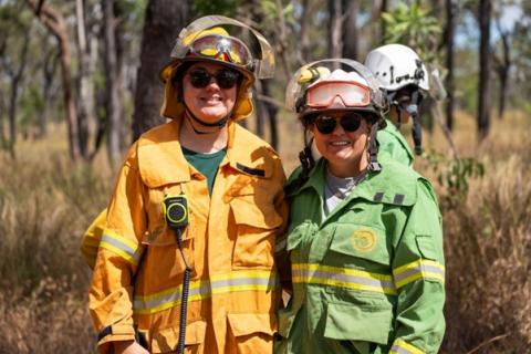 Chloe Swiney and a participant at a prescribed burn on Ewamian Country
